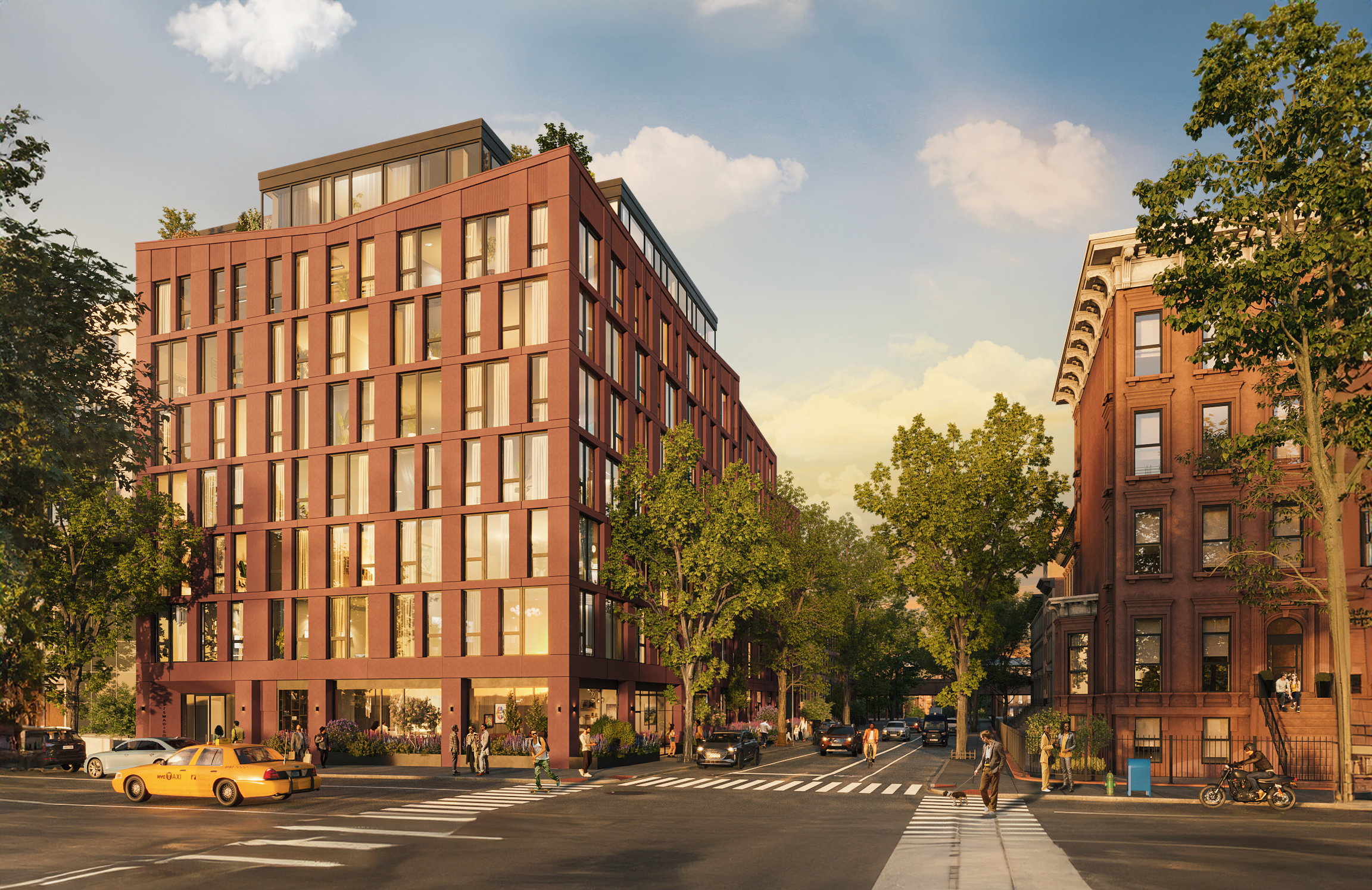 The exterior of the 1975 Madison Ave building is located on a charming tree-lined street.
